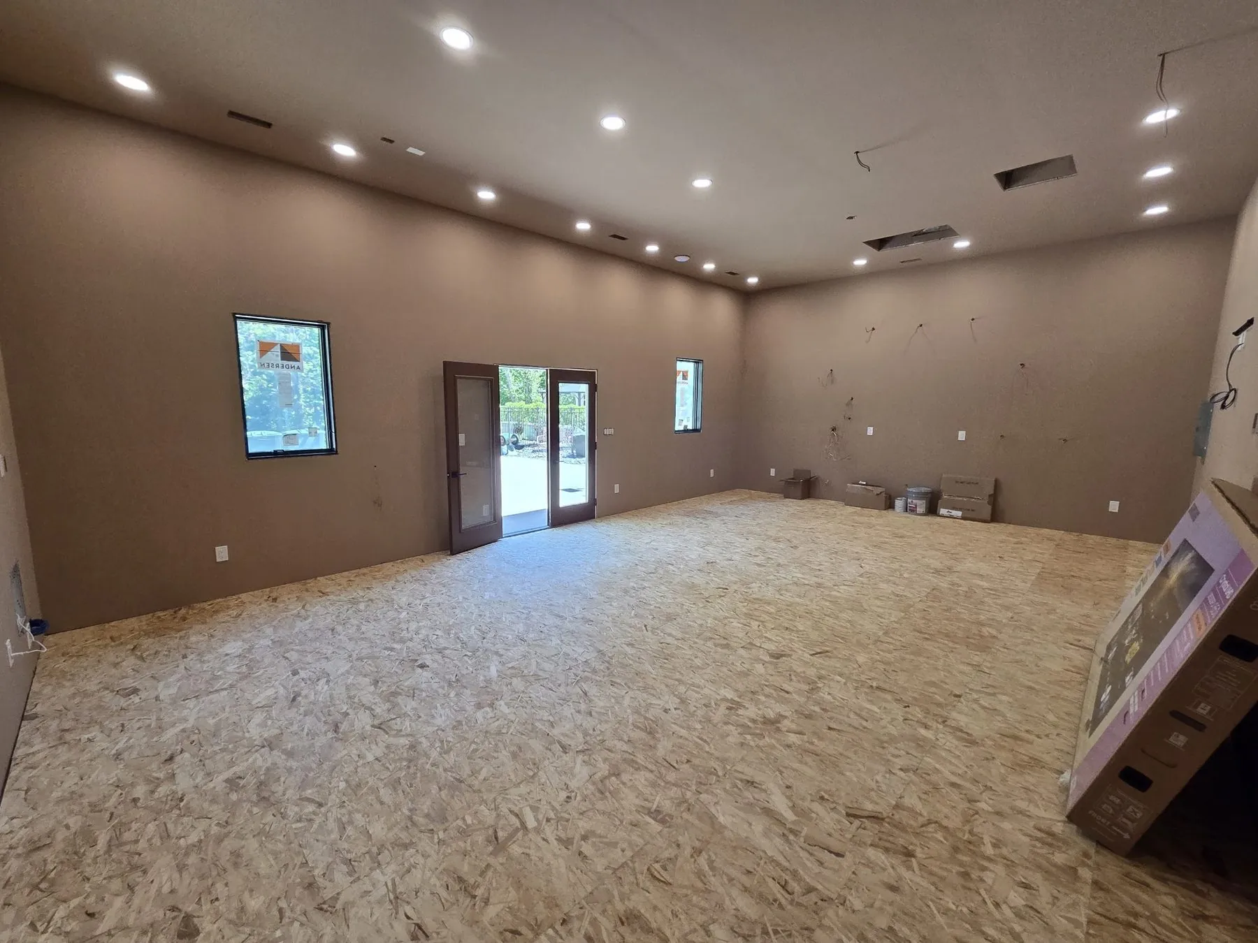 Wide interior view of the custom Giordano golf simulator building