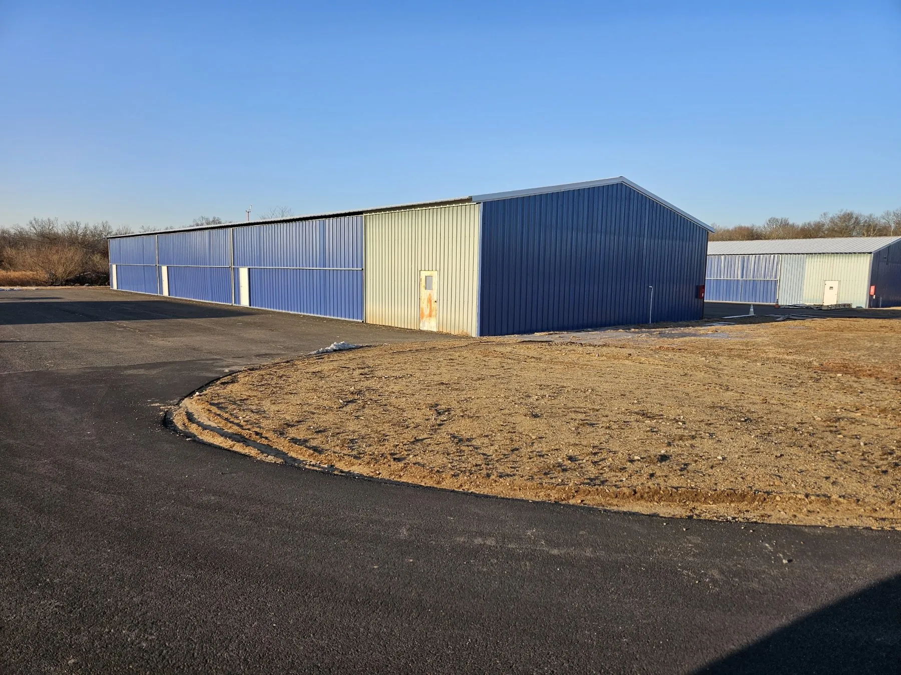 Completed reroofed and resided aircraft hangar at Somerset Airport